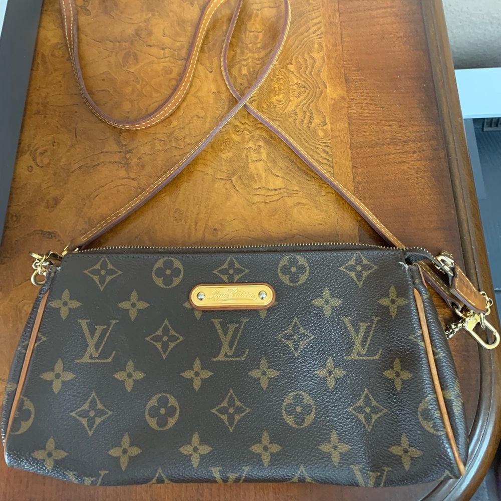 Rare Monogram Eva clutch crossbody
